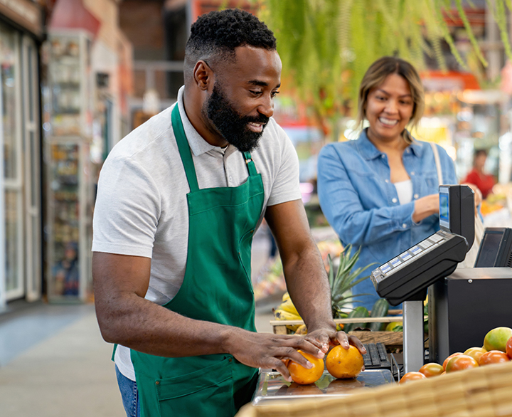 cashier at an outdoor farm stand