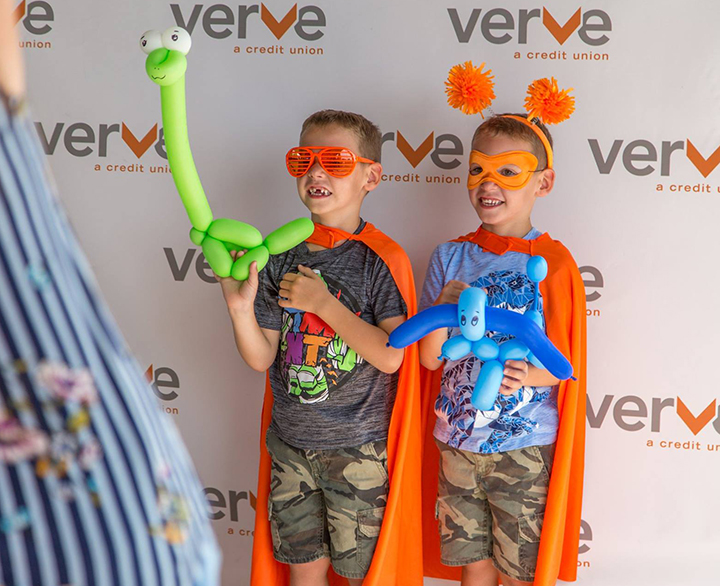 kids with balloon animals at a Verve event