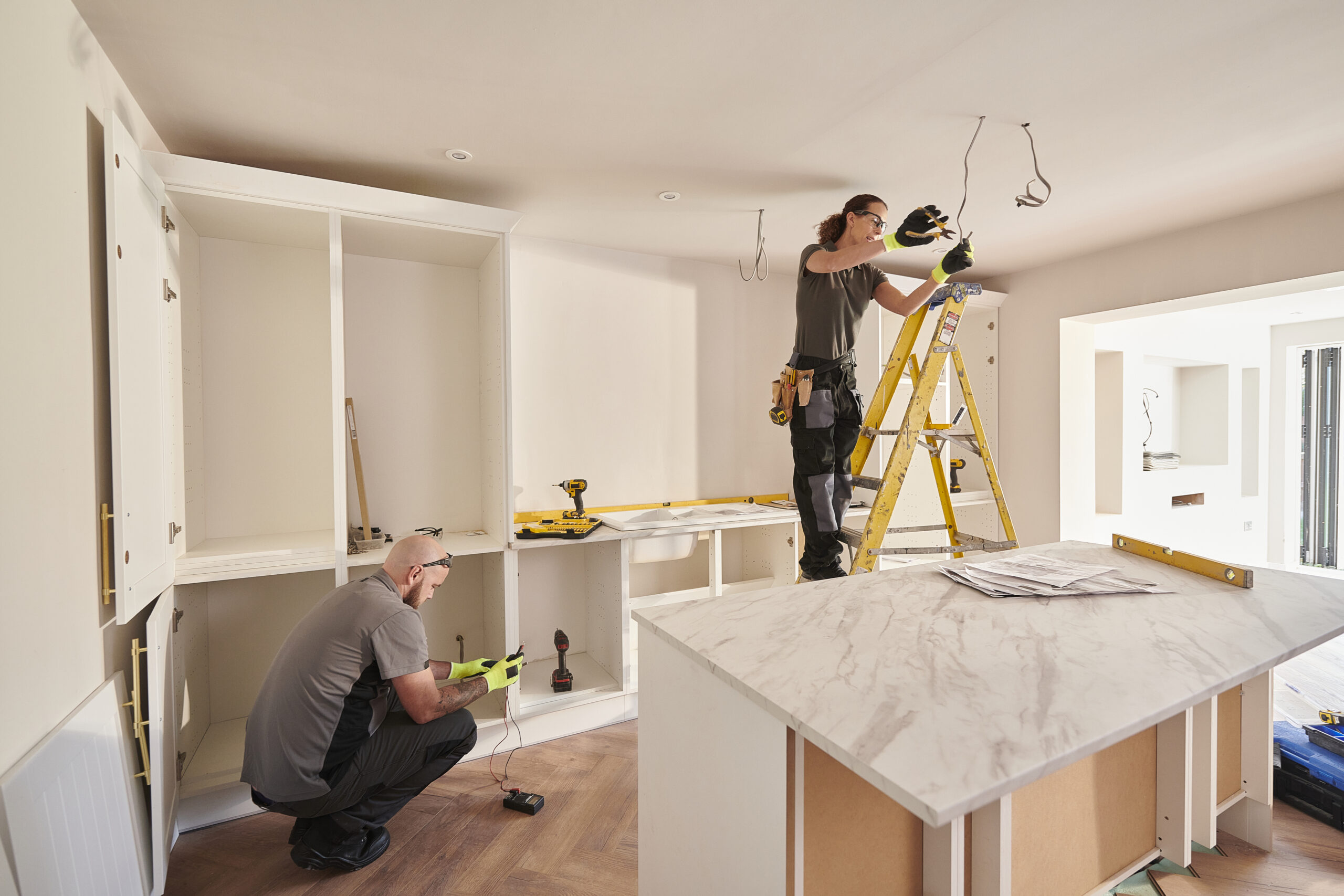 People updating their kitchen